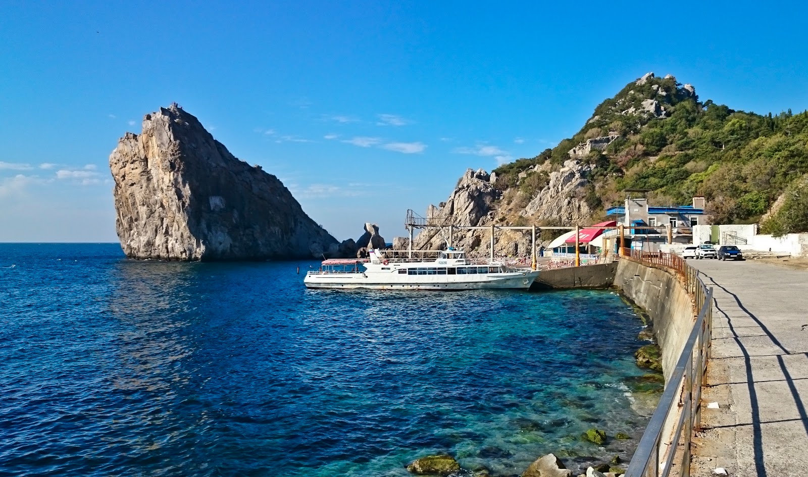 Photo of Simeiz beach with turquoise pure water surface