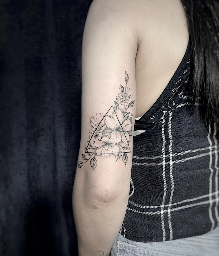 Explore fine line name tattoo ideas, creative tattoo ideas in Houston, available at Black Swan Tattoo Studio