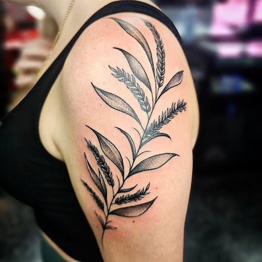 Explore sexiest tattoo ideas for men, creative tattoo ideas in Fort Myers, available at Loyal 2 The Coil Tattoos & Piercings (Edison Mall Location Entrance F)