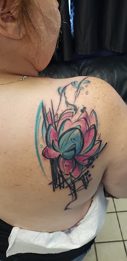 Explore ice hockey tattoo ideas, creative tattoo ideas in Ocala, available at Black Lotus Tattoo & Art Gallery Inc