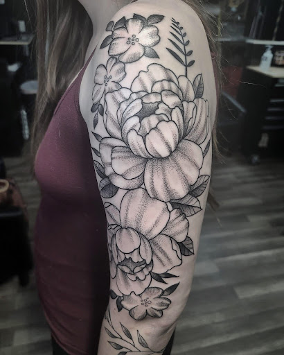 Explore cover up arm tattoo ideas, creative tattoo ideas in Prescott, available at BlackGold Tattoo