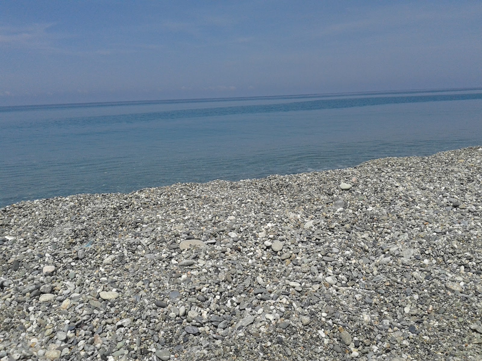 Foto di Scaro-Reggio-Scornavacca-Vardano beach con una superficie del acqua blu
