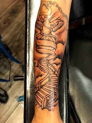 Find dragon arm tattoo ideas for your next unique tattoo in Lexington at LexInk Tattoo