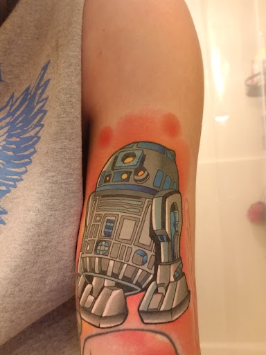 Explore upper arm sleeve tattoo ideas, creative tattoo ideas in Erie, available at Wayward Tattoo Studio