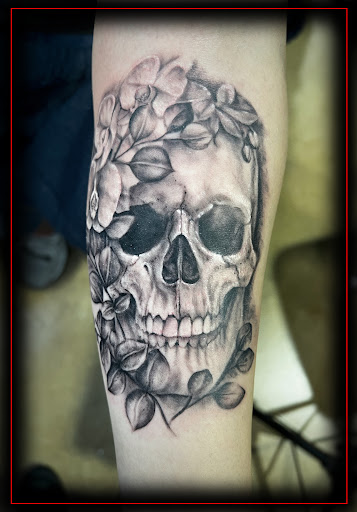 Find wolf tattoo ideas for females for your next unique tattoo in Columbus at Eternal Tattoo & Body Piercing - Columbus