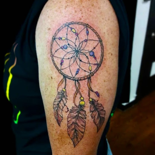 Explore wrist cross tattoo ideas, creative tattoo ideas in Canon City, available at Royal Gorge Custom Tattoos & Piercings LLC
