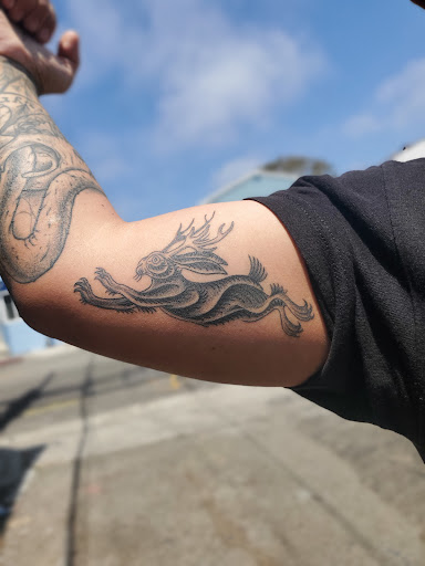 Explore mother son tattoo ideas, creative tattoo ideas in Venice, available at KISS KISS TATTOO & PIERCING