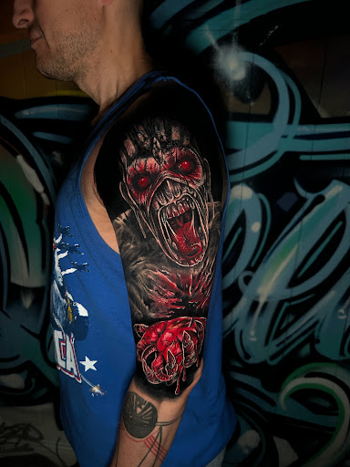 Find top of head tattoo ideas for your next unique tattoo in Corona at Crop Circles Tattoo Studio