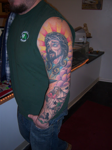 Explore cover up tattoo ideas on hand, creative tattoo ideas in Hebron, available at Explosive Ink Tattoo