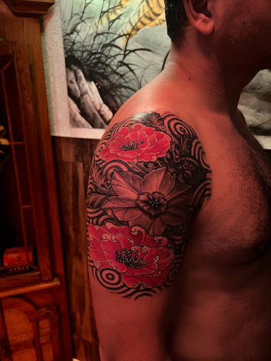 Explore clown tattoo ideas, creative tattoo ideas in Hudson, available at The Bohemian Social Club