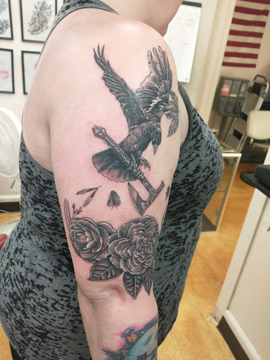 Explore tattoo ideas for women's arms, creative tattoo ideas in Oelwein, available at Purple Thistle Tattoo