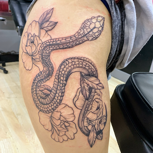 Explore female tattoo sleeve ideas, creative tattoo ideas in San Antonio, available at Ink & Iron Tattoos & Piercings