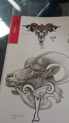 Explore grease tattoo ideas, creative tattoo ideas in Hattiesburg, available at Hattiesburg Tattoo