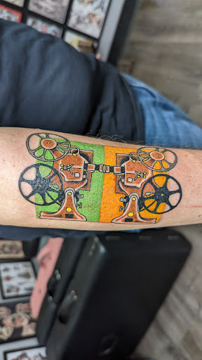 Explore stomach tattoo ideas for men, creative tattoo ideas in Loveland, available at Satori Tattoo