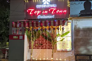 Top In Town image