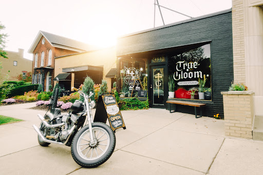 Explore barber pole tattoo ideas, creative tattoo ideas in Buffalo, available at True Gloom Tattoo Studio