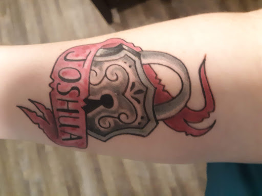 Tattoo Shop «Liquid Tattoo», reviews and photos, 16583 Old U.S. 27, Lansing, MI 48906, USA