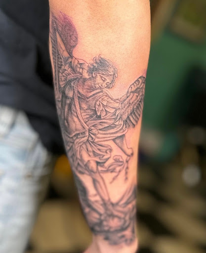 Explore ghost tattoo ideas, creative tattoo ideas in Peoria, available at Modern Ink Tattoo