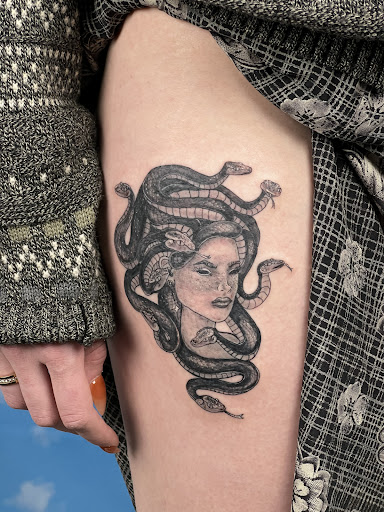 Find dragon tattoo ideas male for your next unique tattoo in Syracuse at Perfect Storm Tattoo