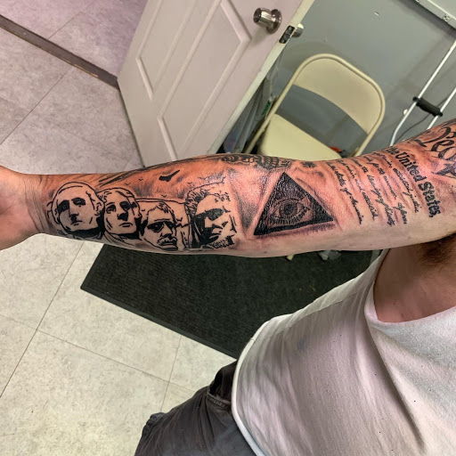 Explore ideas for hand tattoos, creative tattoo ideas in Hudson Falls, available at ALTERED ADDICTION TATTOOS