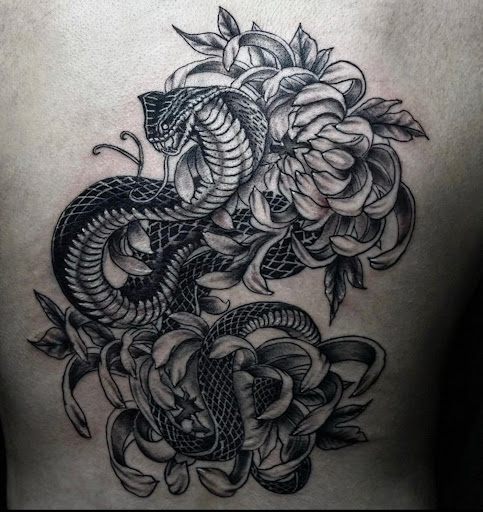 Explore tattoo cover up ideas for hand, creative tattoo ideas in Glendale, available at Black Raven Tattoo