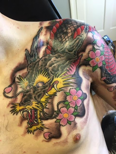 Find angel tattoo ideas for ladies for your next unique tattoo in Lake Charles at Brooklyn Gator Tattoo