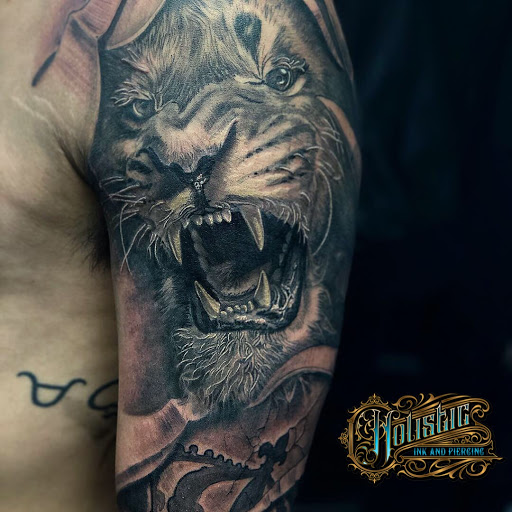 Explore kayak tattoo ideas, creative tattoo ideas in Dorchester, available at Holistic Ink Boston Tattoo Shop