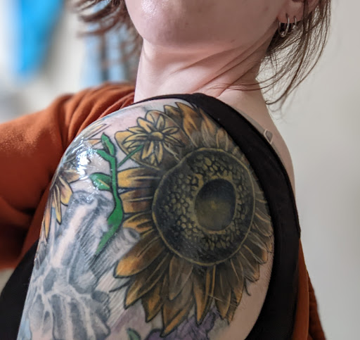 Explore split personality tattoo ideas, creative tattoo ideas in Omaha, available at Inkfu Tattoo Studio