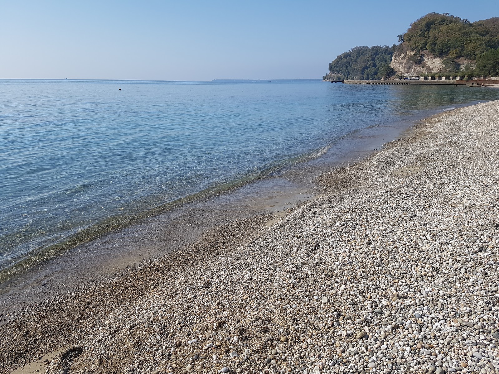 Miussera beach'in fotoğrafı uçurumlarla desteklenmiş