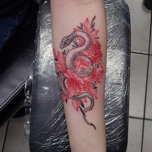 Explore female wrist tattoos ideas, creative tattoo ideas in Greenfield, available at Garden of Eden Tattoos