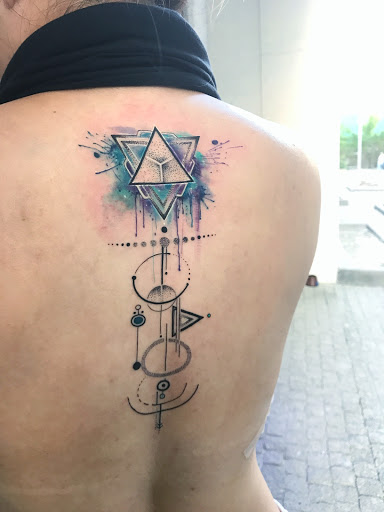 Explore tattoo ideas men upper arm, creative tattoo ideas in Miami, available at Miami Tattoo & Co Midtown