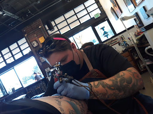 Explore mom tattoo ideas for son, creative tattoo ideas in Gilbert, available at Fifth Estate Tattoo