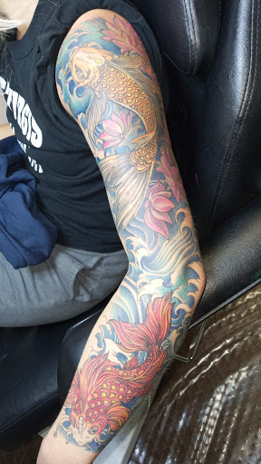 Explore dopamine tattoo ideas, creative tattoo ideas in Angola, available at Hoodlum Ink