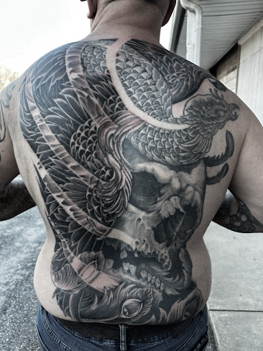 Explore moto tattoo ideas, creative tattoo ideas in Greer, available at Inkslingers Electric Tattooing