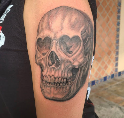 Explore lung cancer ribbon tattoo ideas, creative tattoo ideas in Stuart, available at Tiger Shark Tattoo Studio