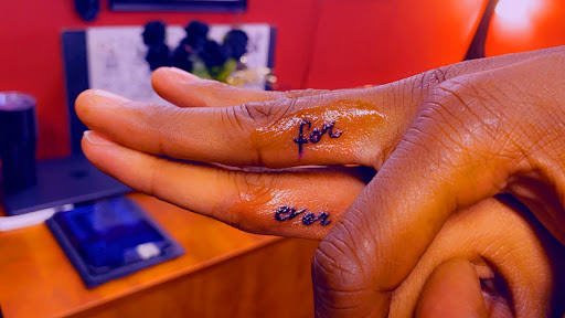 Explore tattoo ideas for men's back, creative tattoo ideas in Stafford, available at Tattooz By King