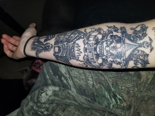 Explore henna tattoo ideas for guys, creative tattoo ideas in Corinth, available at Suspended Animation Tattoos