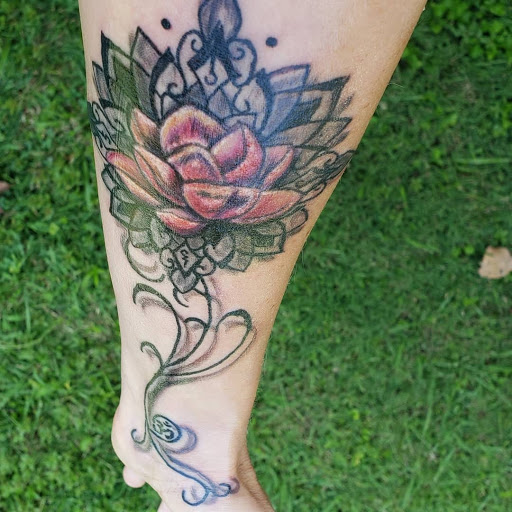 Explore venom tattoo ideas, creative tattoo ideas in Monroe, available at The House of Ink