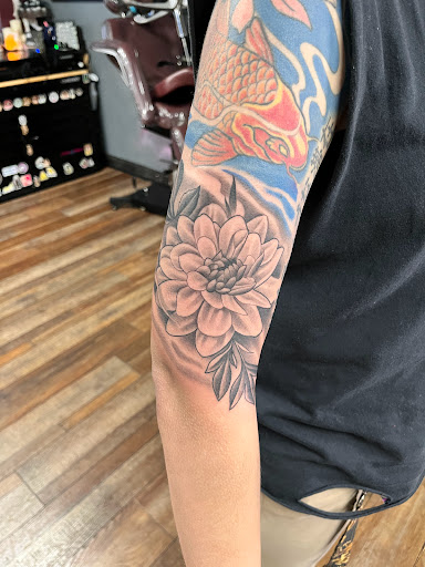 Explore cycling tattoo ideas, creative tattoo ideas in Clarksville, available at Dark Raine Tattoo