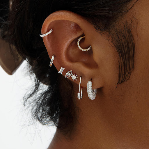 Explore trash polka tattoo ideas, creative tattoo ideas in Seattle, available at STUDS Capitol Hill