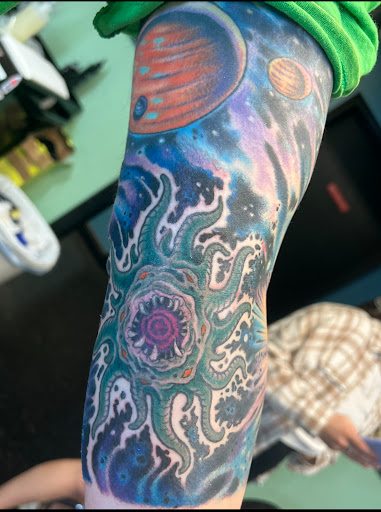 Explore religious elbow tattoo ideas, creative tattoo ideas in Bethlehem, available at Steel City Tattoo