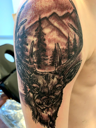 Explore solid black tattoo ideas, creative tattoo ideas in Seymour, available at American Gypsy Tattoo Corp.