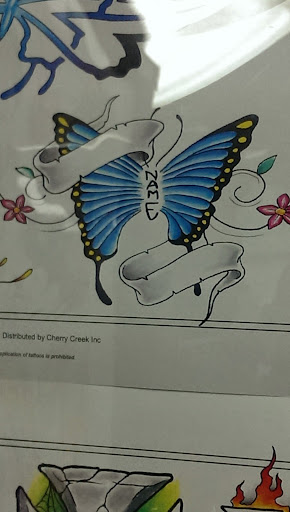 Find tattoo ideas for new moms for your next unique tattoo in Raleigh at Warlocks Tattoo Inc (No Piercings)