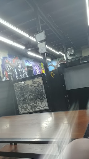 Tattoo Shop «Shrunkin Head Tattoo», reviews and photos, 4438 St John Ave, Kansas City, MO 64123, USA