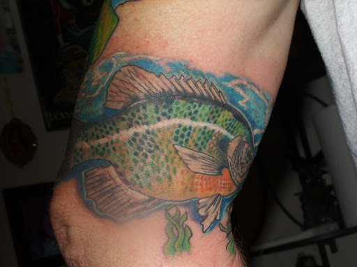 Explore darts tattoo ideas, creative tattoo ideas in Rome, available at Inksanity Tattoo Studio
