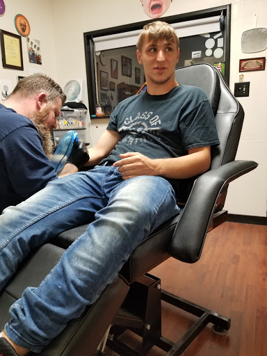 Explore cm punk tattoo ideas, creative tattoo ideas in Monticello, available at Its Just A Flesh Wound