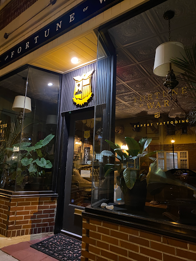 Explore family flower tattoo ideas, creative tattoo ideas in Oyster Bay, available at The Fortune of War