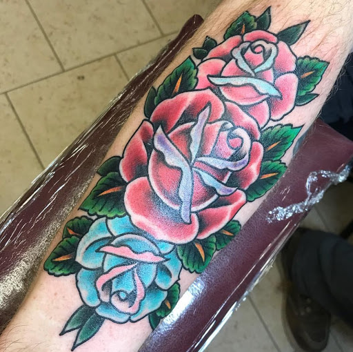 Find tattoo ideas roses for your next unique tattoo in Libertyville at Lucky Seven Tattoo