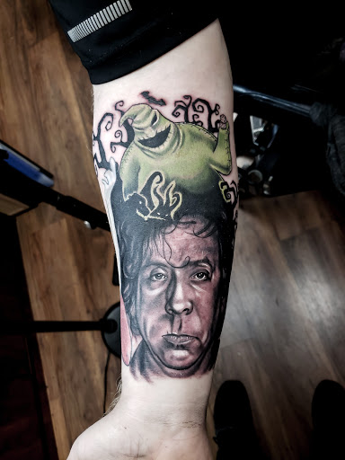 Explore unique tramp stamp tattoo ideas, creative tattoo ideas in Calhoun, available at A Sailors Grave Tattoo Parlor