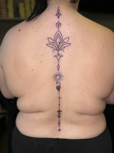 Explore foot tattoo ideas for female, creative tattoo ideas in Watford City, available at Soulful Ink Studios